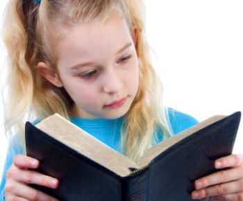 Girl reading her Bible